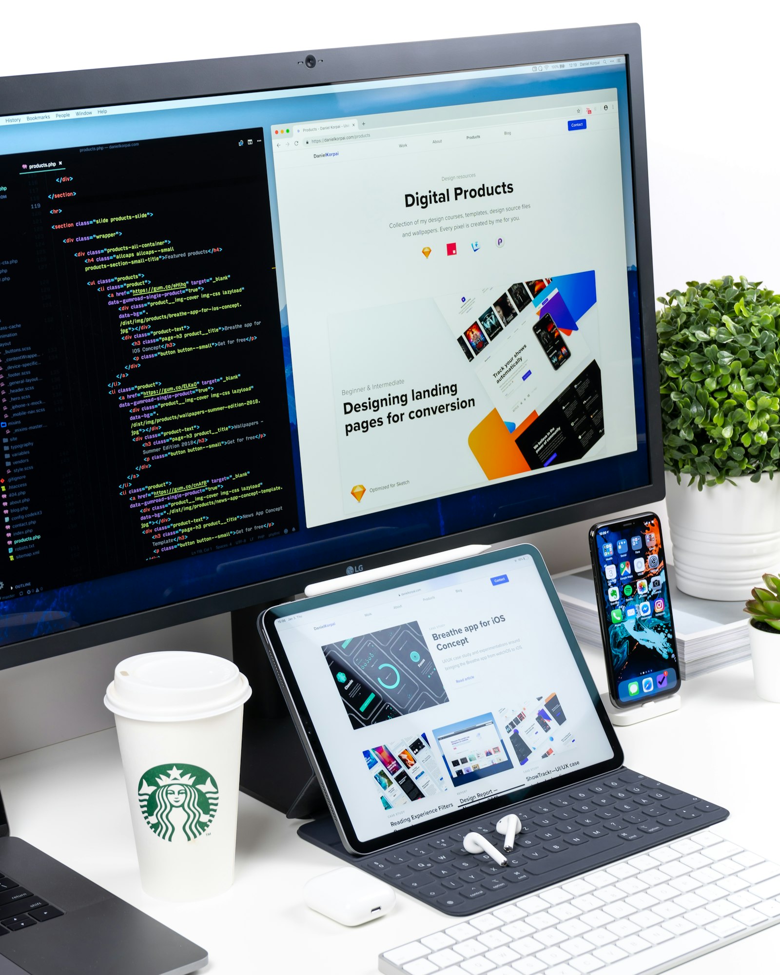 Laptop showing a website layout on a wooden desk